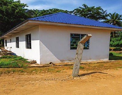 Completed pump house with blue roof
