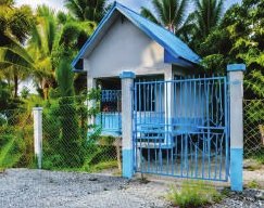 Pump house with gate and fence
